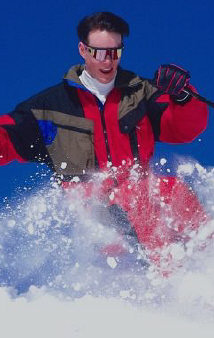 Man skiing in fluffy snow, wearing cool sunglasses